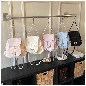 Detailed display of fashionable PU leather backpacks in five colors with bow buckle