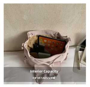 Pink velvet backpack interior showing spacious storage for a laptop and tablet