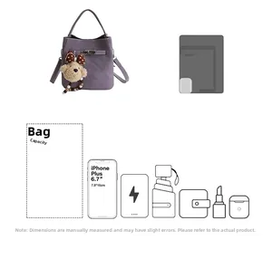 Detailed capacity guide for purple bucket bag with plush bear charm and size comparison