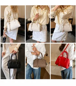 Dettaglio della borsa Boston in pelle martellata nei colori bianco, nero, kaki e rosso