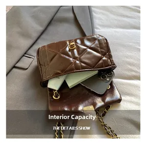 Interior view of brown quilted crossbody bag showing storage capacity for daily essentials
