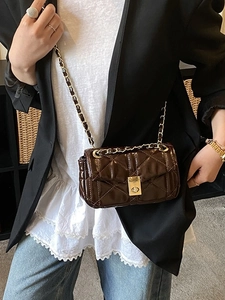 Deep brown quilted chain shoulder bag with glossy finish and gold turn-lock closure