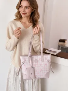 Pink and white checkered tote bag featuring cartoon cat prints and matching mini pouch