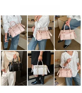 Detail view of stylish textured leather tote bags in pink, black, and white colors