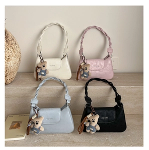 Detailed grid of rectangular PU leather bags in white, pink, blue, and black with bear charms