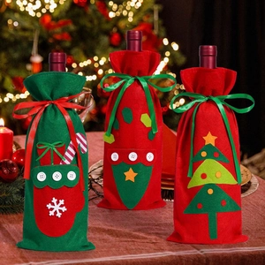 Three-piece Christmas felt wine bottle covers with tree and snowflake applique detail