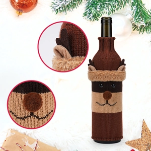 Close-up of reindeer knitted wine bottle cover with 3D antlers and plush details