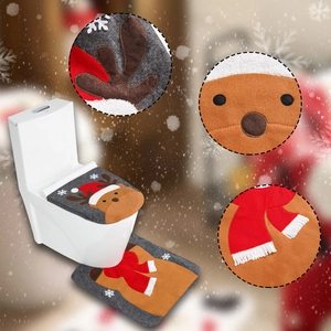 Detail of Christmas reindeer toilet seat cover and matching non-slip rug set