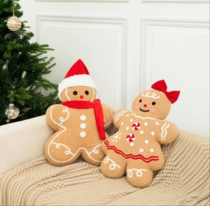 Close-up of ginger-bread man plush pillows in brown sherpa fabric on a cozy sofa