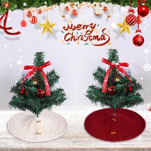 Mini knitted Christmas tree skirts in red and cream white with wooden buttons