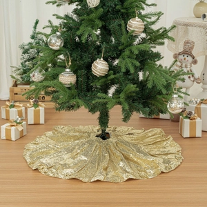 Close-up of a sparkling gold sequin Christmas tree skirt in a festive holiday home setting