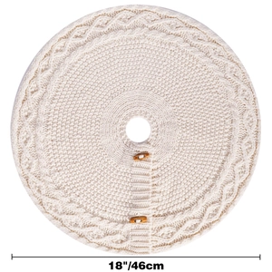 Detail of cable knit texture on cream Christmas tree skirt with wooden toggle buttons