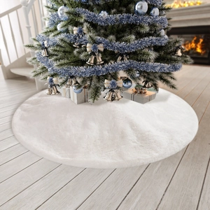 Detail of soft white faux fur Christmas tree skirt with plush texture and long hair