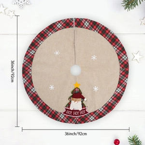 Detailed view of 36-inch Christmas tree skirt with plaid borders and snowflake patterns