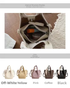Detail of lychee pattern leather bucket bag with inner pouch and silk scarf accessories