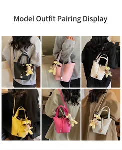 Collage of leather bucket bags in six colors featuring lock charms and dog plushies