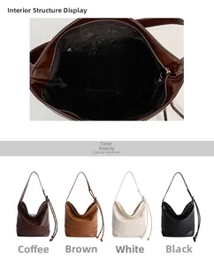 Detail view of large hobo bag interior with zip pocket and knotted strap detail