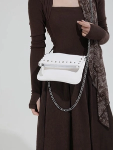 Minimalist white rivet chain crossbody bag shown on a model with premium retro style