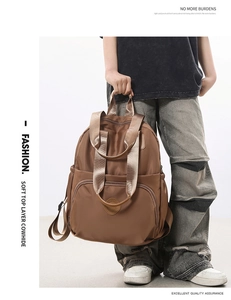 Detail of soft top layer cowhide backpack in khaki brown showing large capacity texture