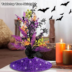 Halloween tabletop tree with purple glitter tree skirt and black spider web accents
