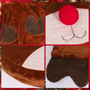 Close-up of plush reindeer hat with red pom-pom nose and detailed brown fabric textures