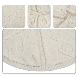 Chunky cable knit Christmas tree skirt in cream white with decorative bow details
