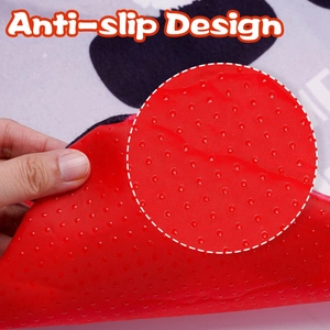 Detailed view of the anti-slip silicone dots on the backing of the Christmas toilet mat