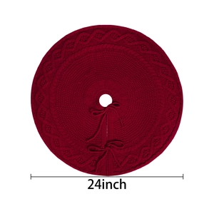 Red 24-inch cable knit Christmas tree skirt with festive bow ties on white background