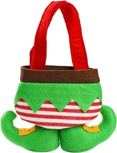 Close-up of felt Christmas elf gift bag with candy stripes and cute elf boots
