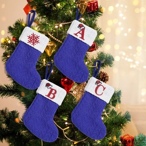 Set of 4 blue knit Christmas stockings with white faux fur cuff and red letter embroidery