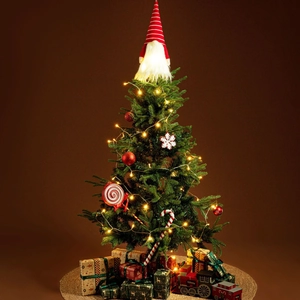 Luminous Nordic Christmas gnome tree topper with striped hat and warm glowing beard