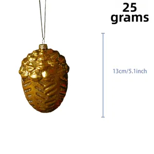 Detailed view of 13cm golden pinecone ornament with metallic texture and dimensions