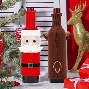 Knitted Santa Claus and reindeer wine bottle covers for festive Christmas table decor