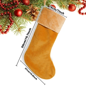 Plush yellow Christmas stocking with tan fur trim and hanging loop for holiday decor