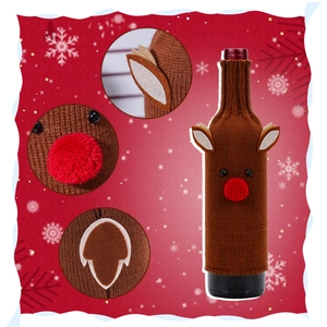 Detail view of knitted reindeer wine bottle cover with soft pom-pom nose and fine textures