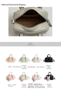 Detail view of large capacity boston bag interior and multiple color options with pendants
