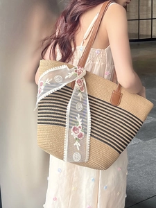 Fashionable large straw tote bag with black stripes and lace ribbon for beach vacation