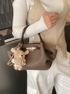 Retro brown leather handbag with metal turn-lock and cute bear pendant for women