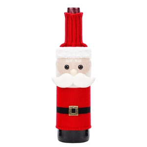 Detail view of knitted Santa wine bottle cover with faux fur trim and belt decoration