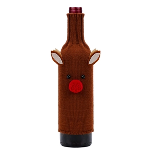 Detail of Christmas reindeer knitted wine bottle cover with 3D ears and red pompom nose
