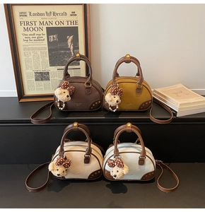Mini Boston handbags in four colors with vintage lychee texture and bear charms