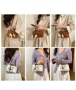Détails de sacs à main élégants marron et beige avec charms de sac en cuir