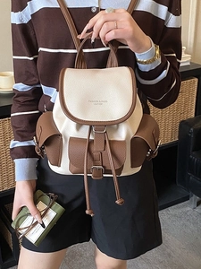 Vintage color-block backpack in brown and beige leather with drawstring and multiple pockets