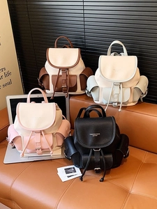 Vintage leather backpacks for women in four colorblock designs with drawstring and flap closure