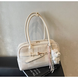 Chic cream checkered PU leather handbag with gold buckle and cute puppy charm on art books