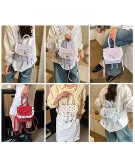 Sac à dos à pois avec dentelle et pendentifs en forme de cœur en diverses couleurs