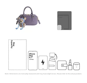 Purple faux leather boston bag detail with bear charm and capacity for a 6.7 inch phone