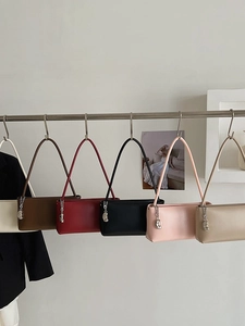 Minimalist leather baguette bags in five colors with silver crescent moon charms