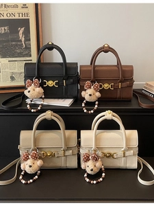 Four retro square handbags in black, brown, khaki and cream with cute bear charms
