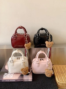 Stylish mini Boston crossbody bag in four colors with cute plush bear charms and handles